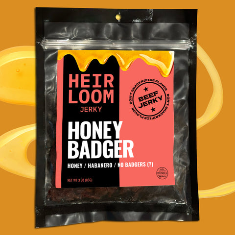 A bag of Honey Badger beef jerky by Heirloom jerky that says the jerky inside is made with honey, habanero, and no badgers (but there's a question mark at the end of the line of flavor indicators). 