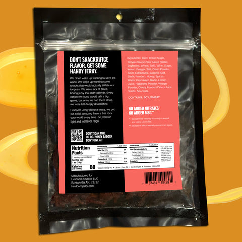 Reverse side of a bag of Honey Badger beef jerky showing the nutritional information, barcode, and ingredients.